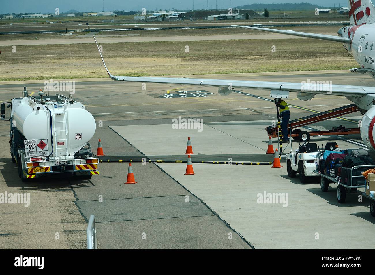 Passenger Jet getting refuelled, rising fuel prices, fuel crisis Stock Photo