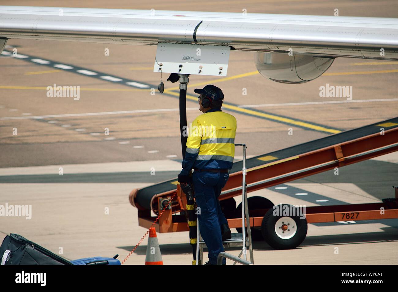 Passenger Jet getting refuelled, rising fuel prices, fuel crisis Stock