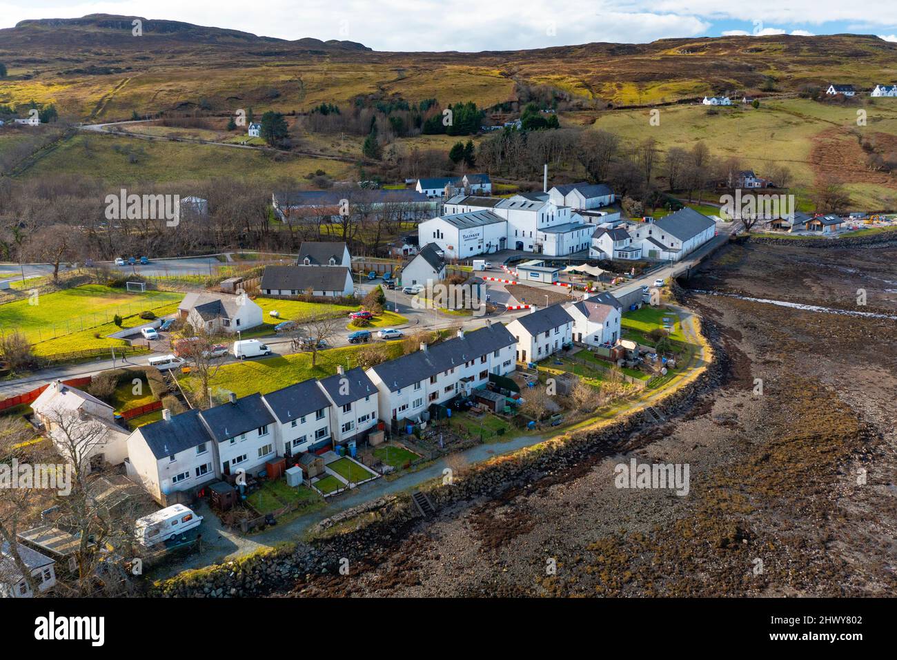 Aerial view from drone of Talisker distillery in Carbost on the Isle of Skye, Scotland, UK Stock Photo