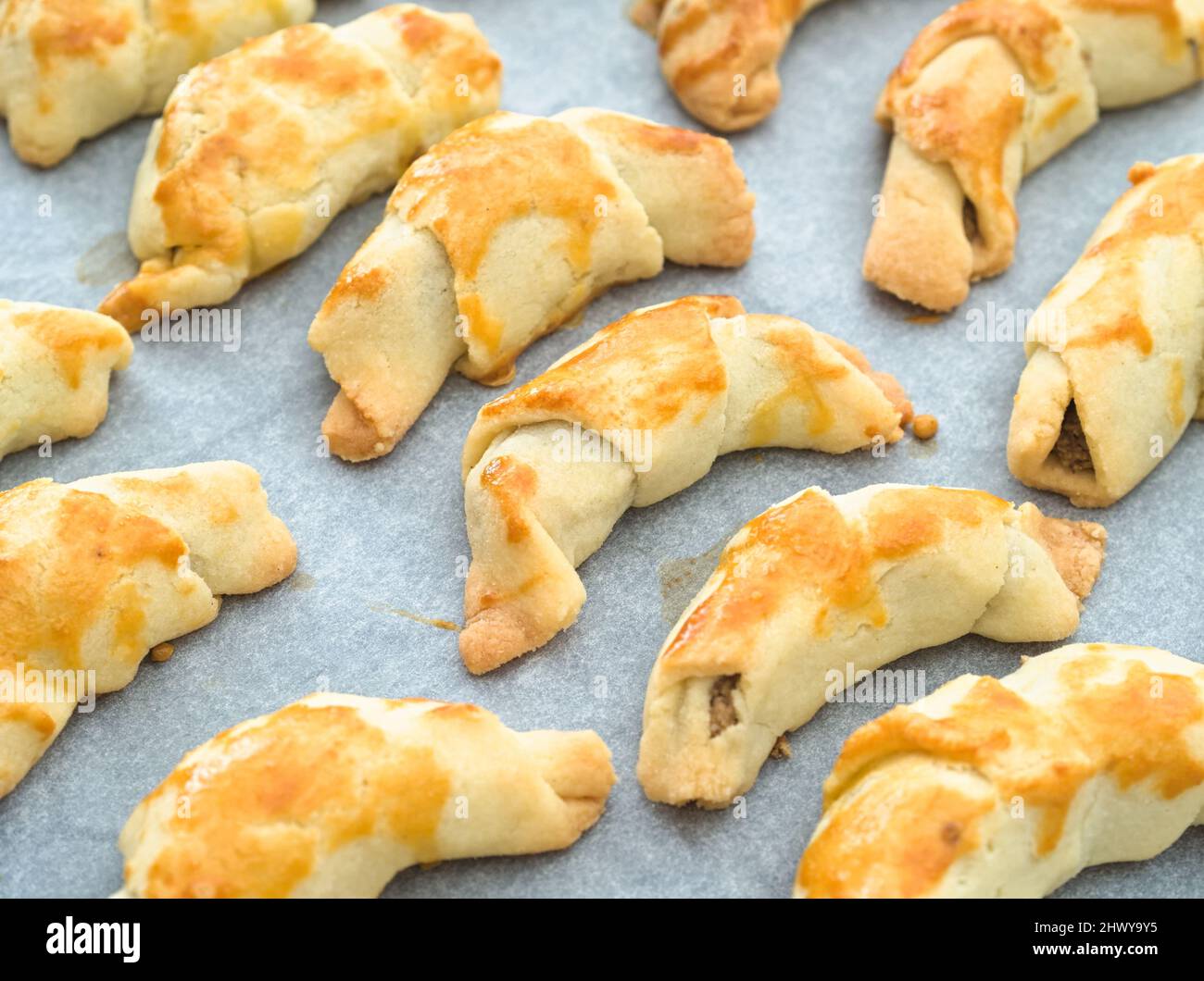 Homemade Traditional Hungarian Walnut Croissants on Baking Sheet Stock Photo