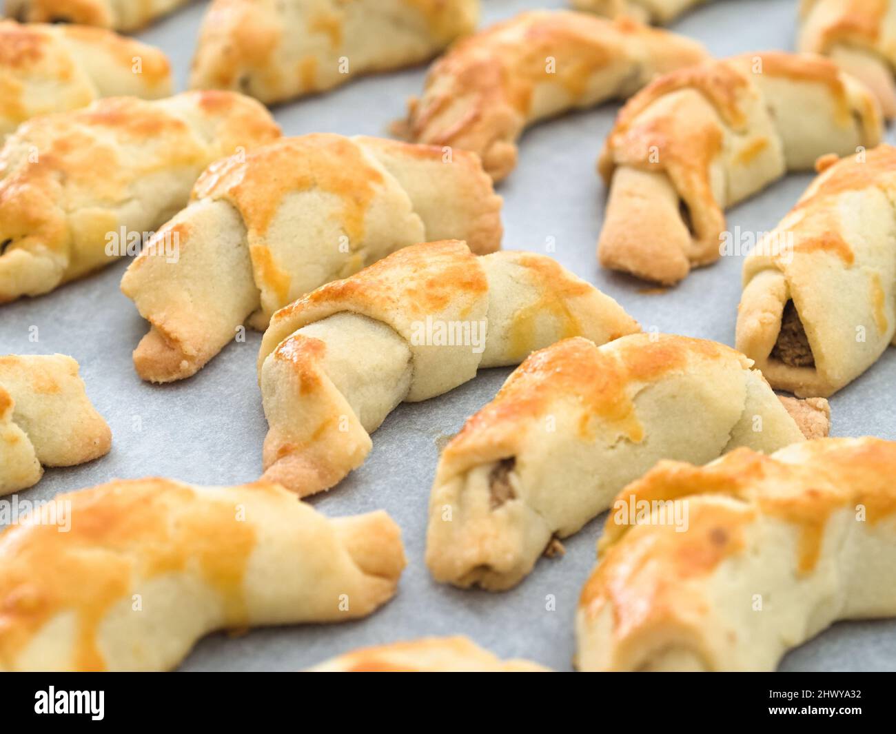 Homemade Traditional Hungarian Walnut Croissants on Baking Sheet Stock Photo