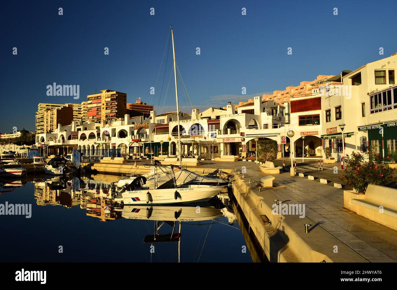 Harbour promenade with bars and restaurants and modern hotels in the town of Aguadulce, province of Almeria southern Spain. Stock Photo