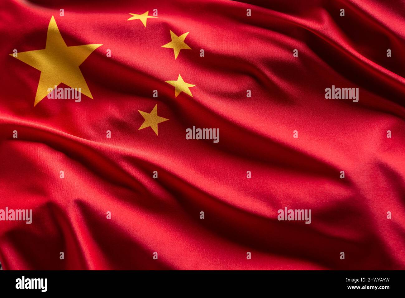 Waving flag of China. National symbol of country and state. Stock Photo