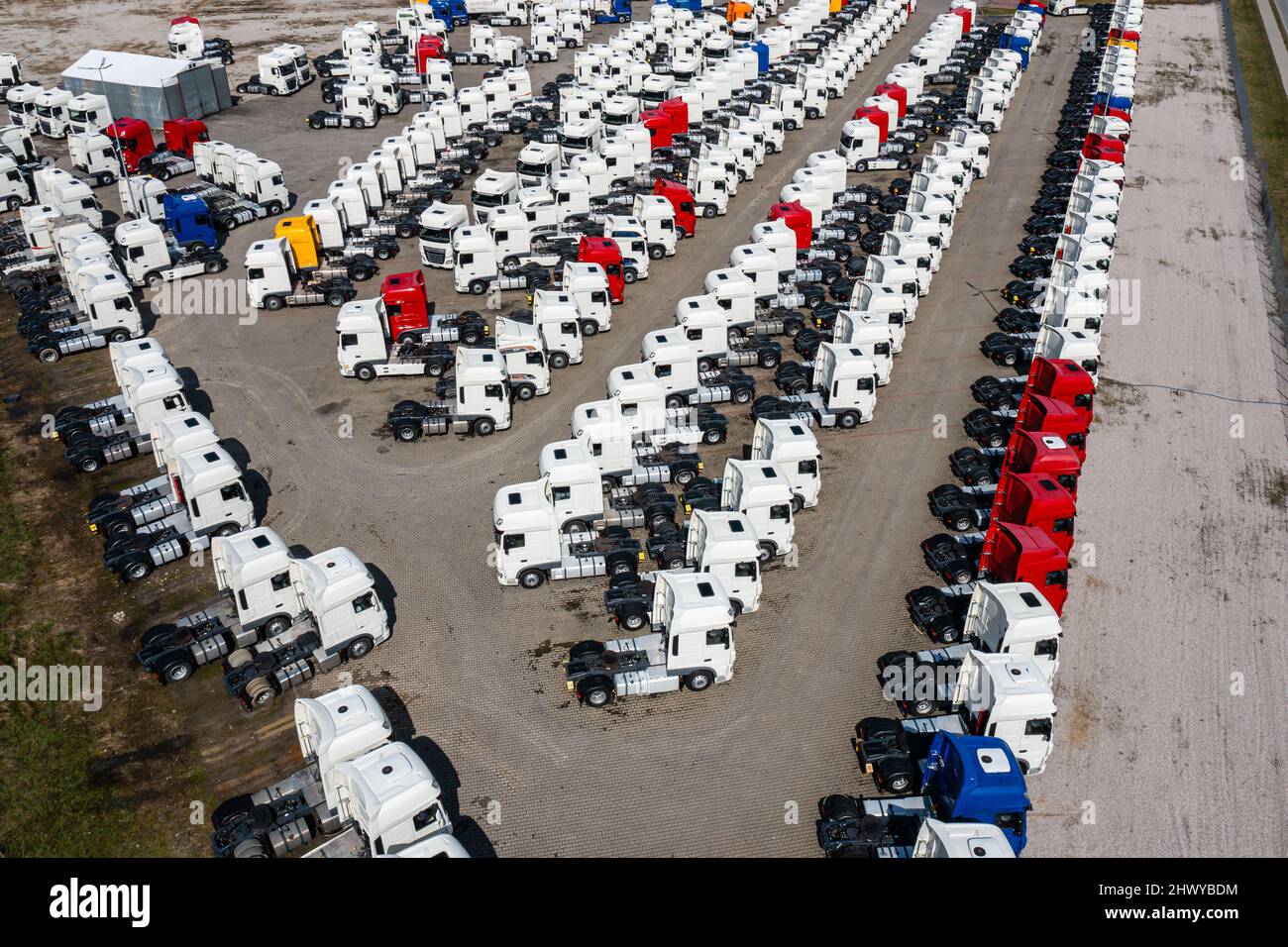 Many trucks on parking lot aerial view Stock Photo - Alamy