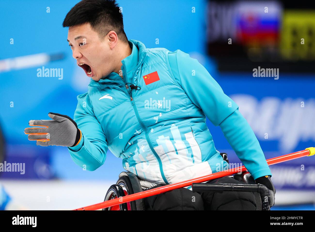 Beijing, China. 8th Mar, 2022. Zhang Mingliang of China reacts during ...