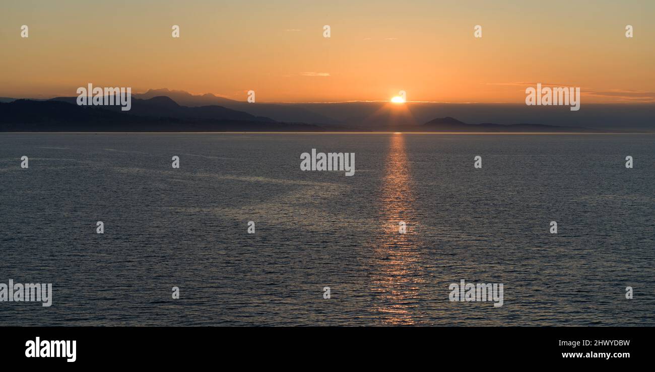Sunset View of Shoreline along Vancouver (Horseshoe Bay) Nanaimo (Departure Bay Stock Photo
