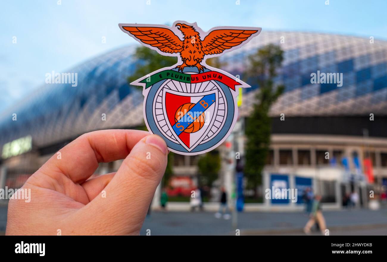 September 12, 2021, Lisbon, Portugal. football club emblem S.L.  Benfica against the backdrop of a modern stadium. Stock Photo