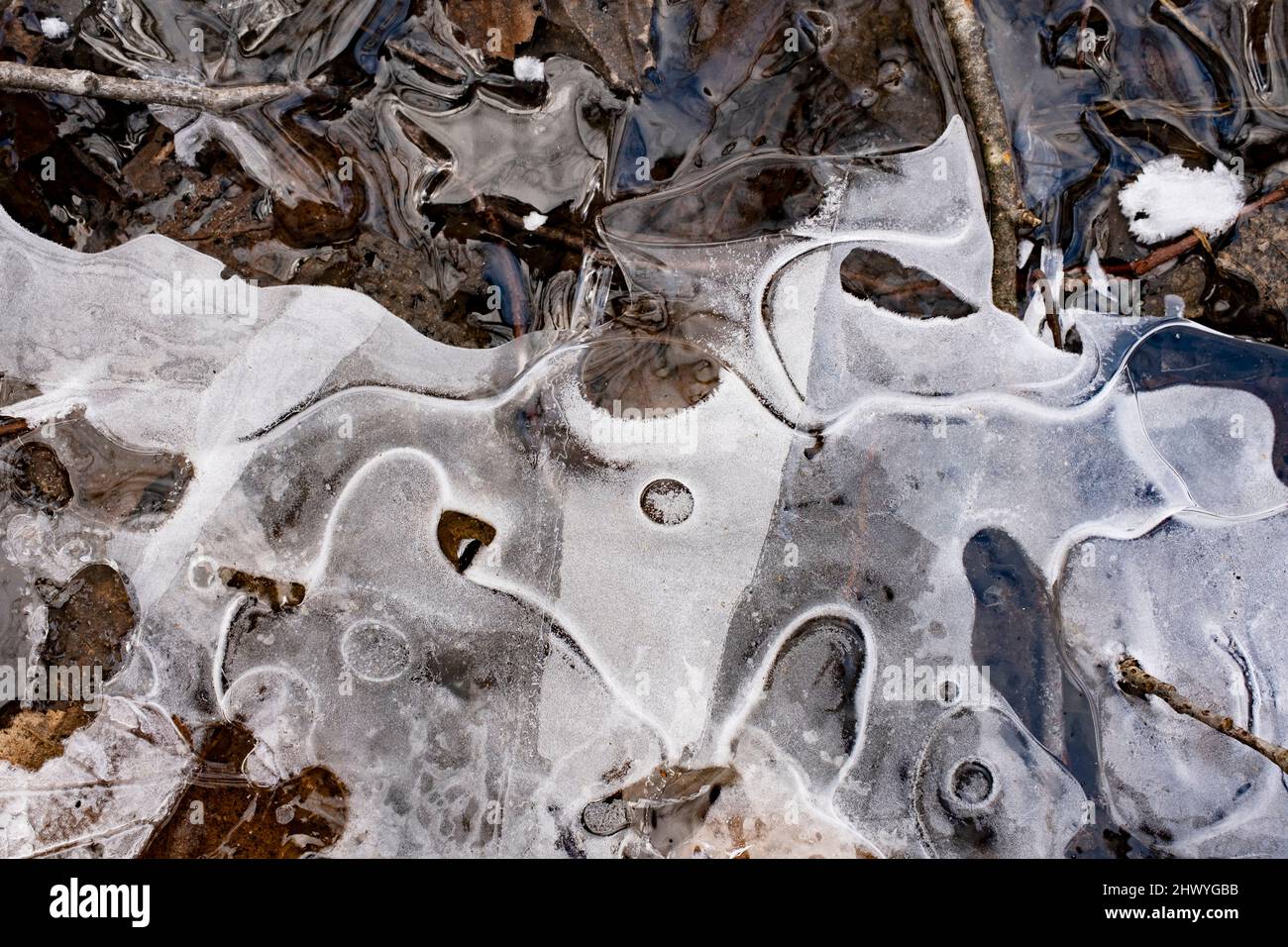 Complex formations of various ice layers in closeup Stock Photo - Alamy