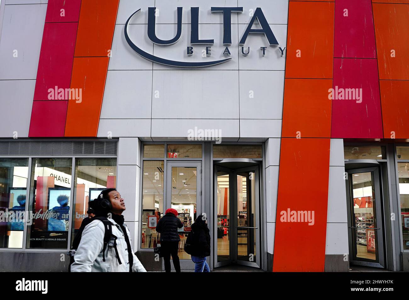 People walk past an Ulta Beauty store in the Manhattan borough of New York City, New York, U.S., March 8, 2022.  REUTERS/Carlo Allegri Stock Photo