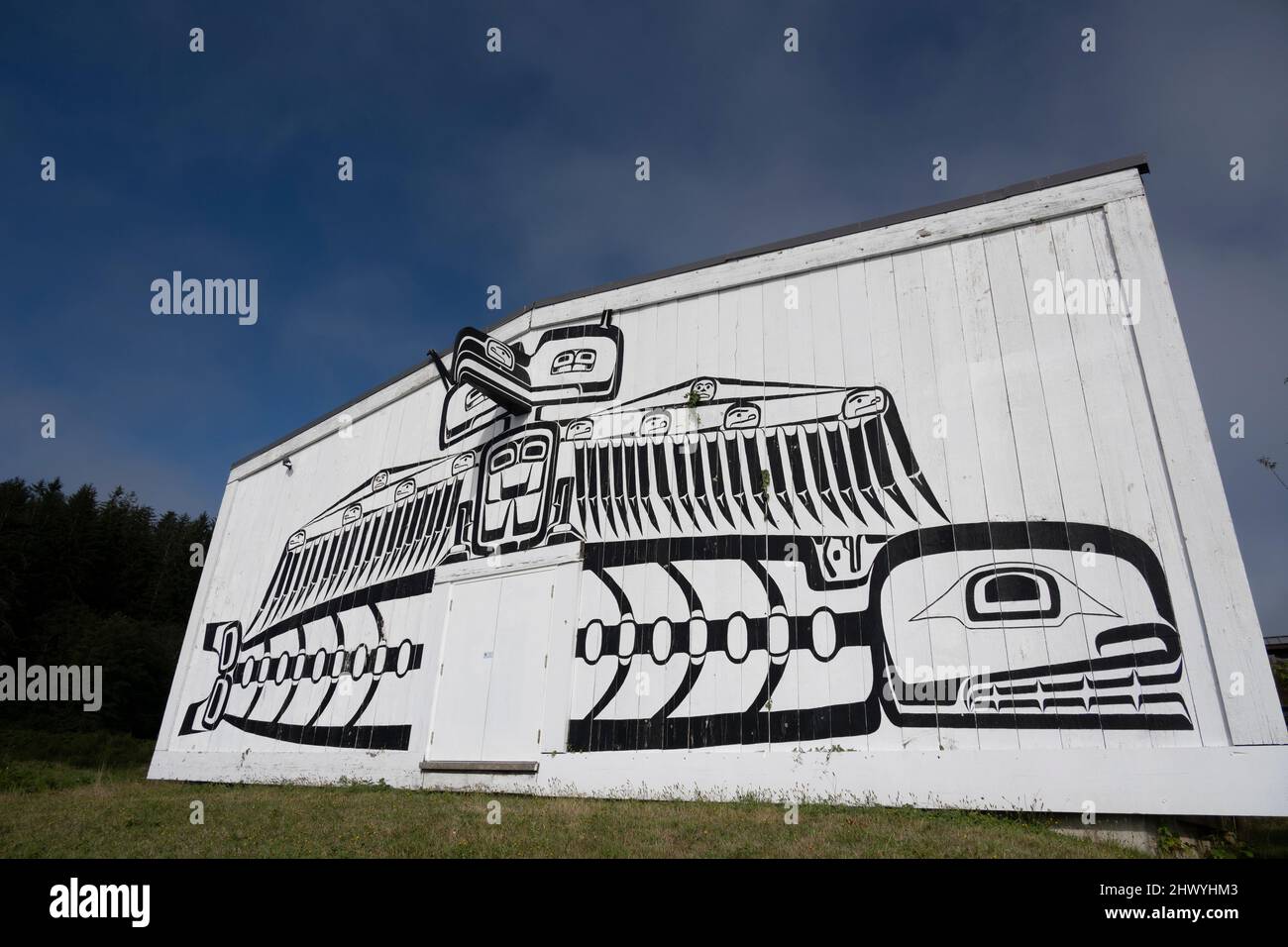 Indigenous Artwork on the exterior of U'mista Cultural Centre in Alert Bay on Cormorant Island, Johnstone Strait, British Columbia, Vancouver Island, Stock Photo
