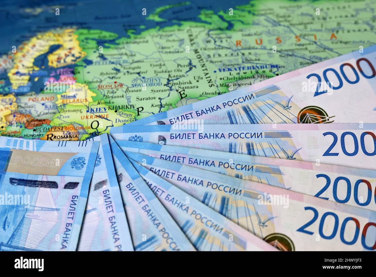 Russian rubles on map of Ukraine and Russia. Concept of russian support for Donbass Stock Photo