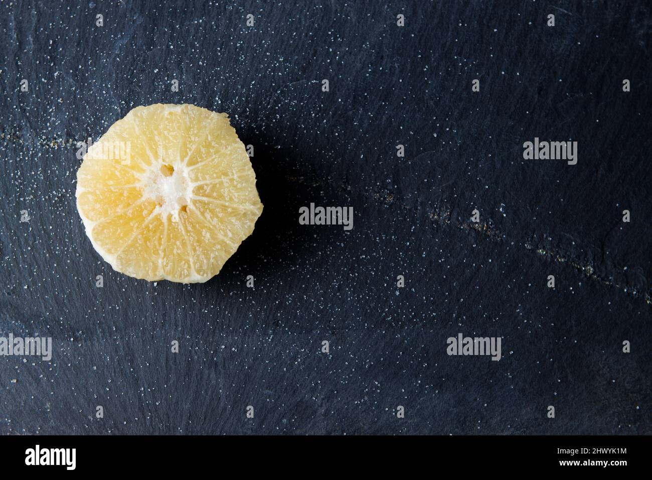 slice of citrus on black background Stock Photo