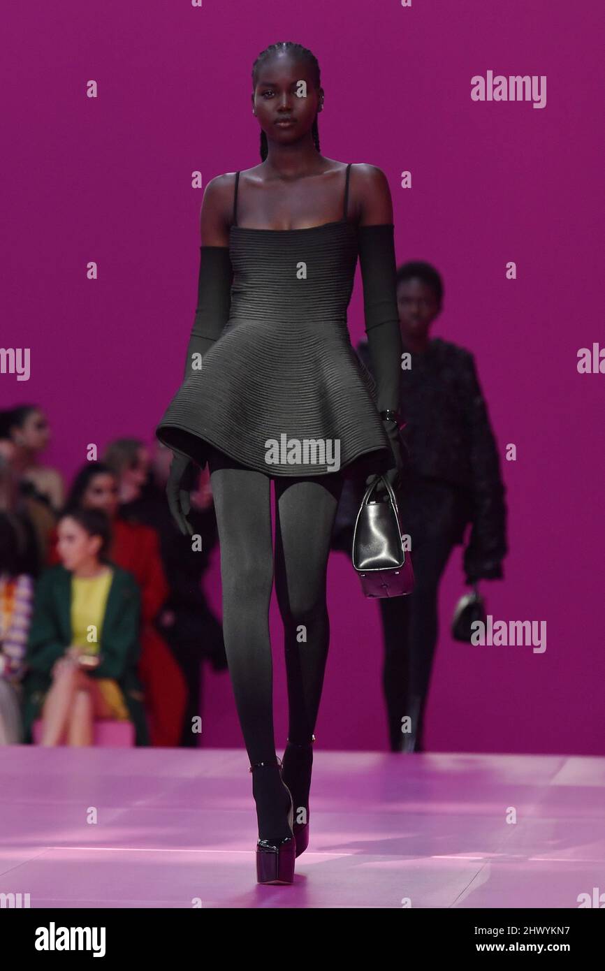 Model Adut Akech walks on the runway at the Valentino fashion show ...