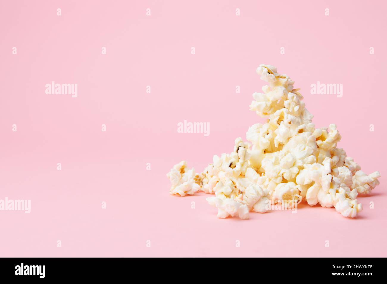popcorn isolated on pink background Stock Photo