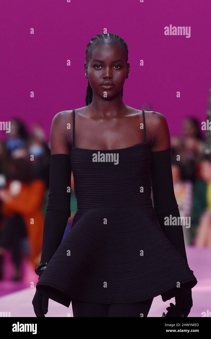 Model Adut Akech walks on the runway at the Valentino fashion show ...