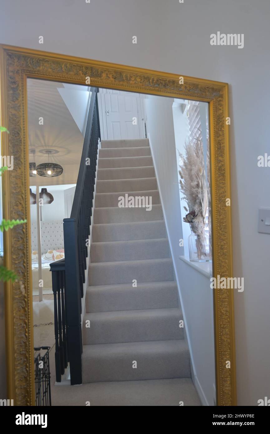 view of staircase in wall mirror Stock Photo