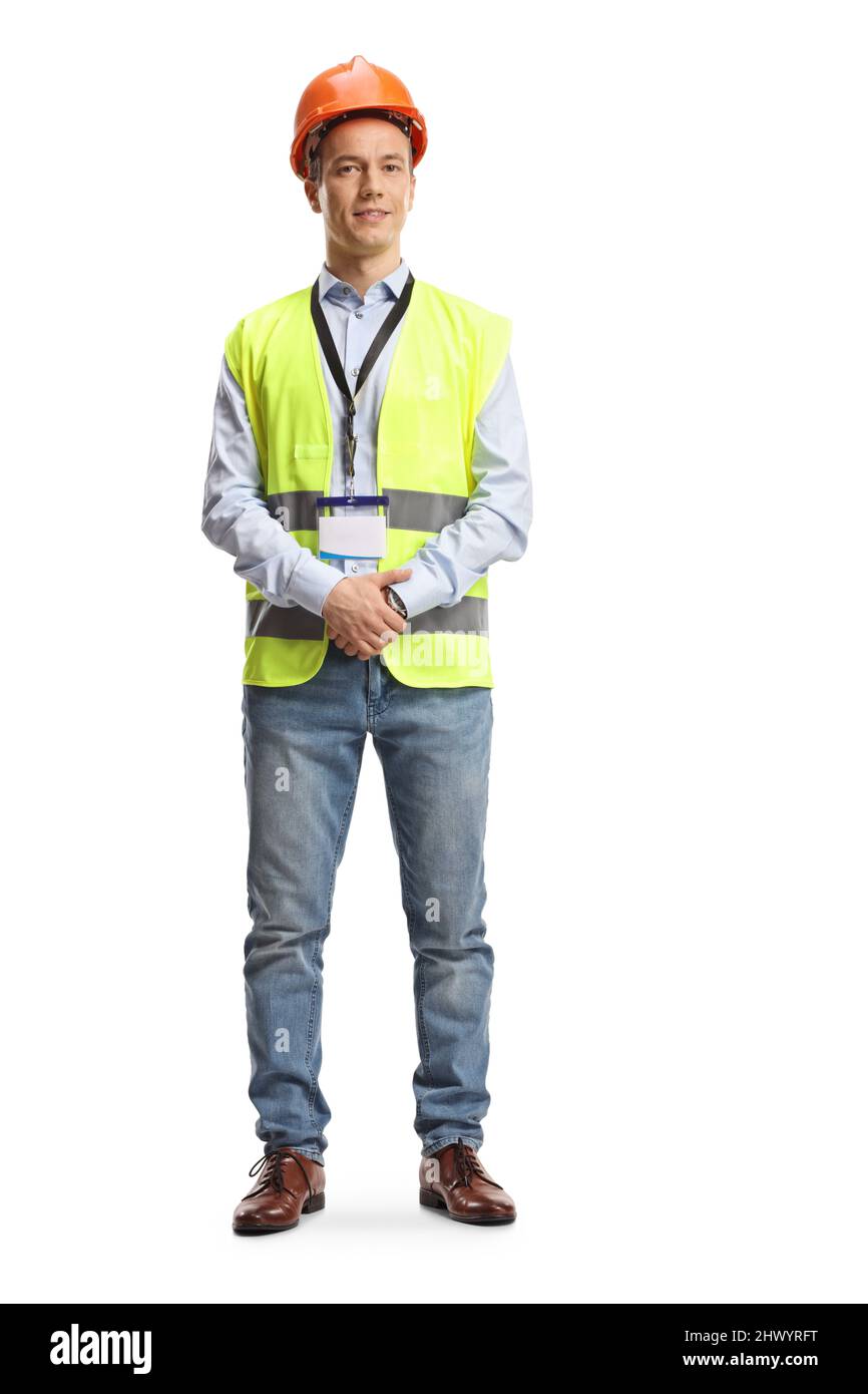 Male engineer with a safety vest and hardhat isolated on blue background Stock Photo