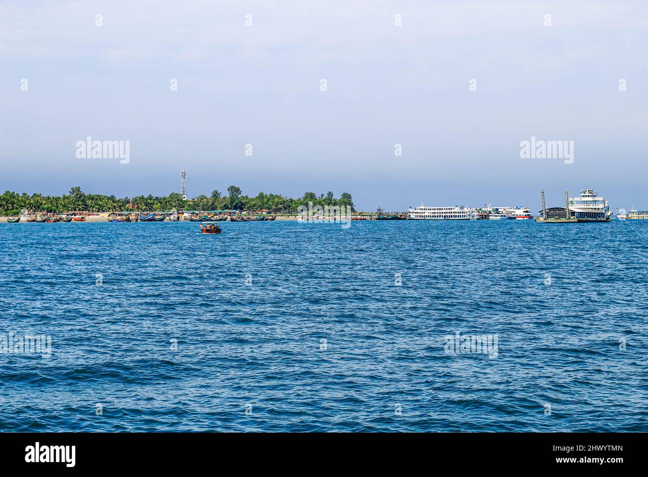 Tourist jetty of St. Martin's Island, Bangladesh. Photo of a seaport on an island with many ships docked. Good to use for outdoor. Stock Photo