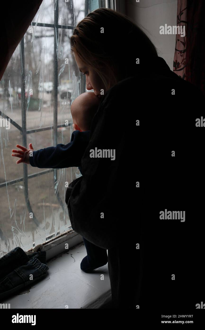 Russia's war against Ukraine. Children hiding in a shelter Stock Photo