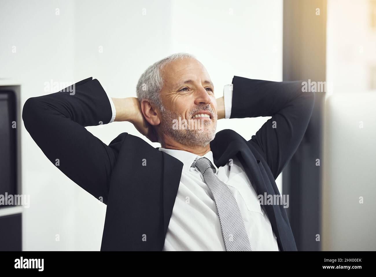 Man desk leaning back hands hi-res stock photography and images - Alamy