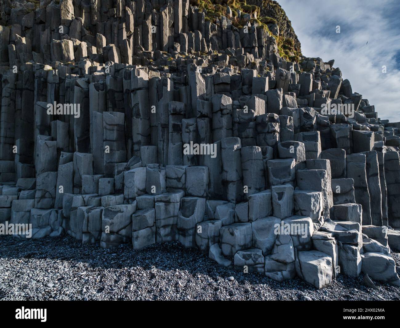 Basalt rock pillars columns at Reynisfjara beach near Vik, South