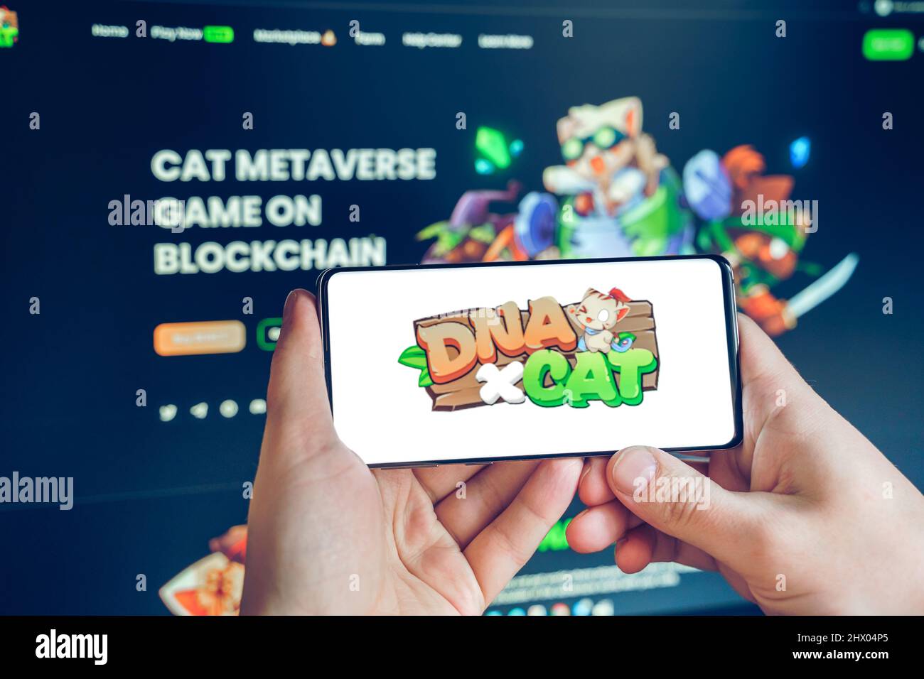 Russia Moscow 25.12.2021 Logo of DNA CAT Metaverse. Blockchain nft ethereum  cryptocurrency strategy game in laptop,mobile phone.Man playing for crypto  Stock Photo - Alamy