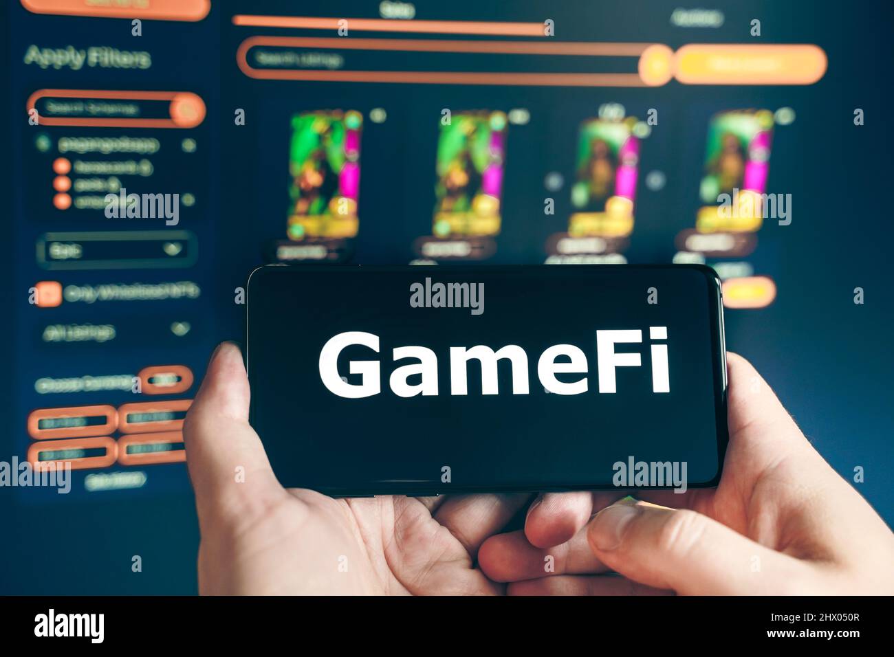 Russia Moscow 25.12.2021 Logo of Gamefi, GAFI. Blockchain nft ethereum  cryptocurrency strategy game. Man playing in laptop,mobile phone. Crypto  coin Stock Photo - Alamy