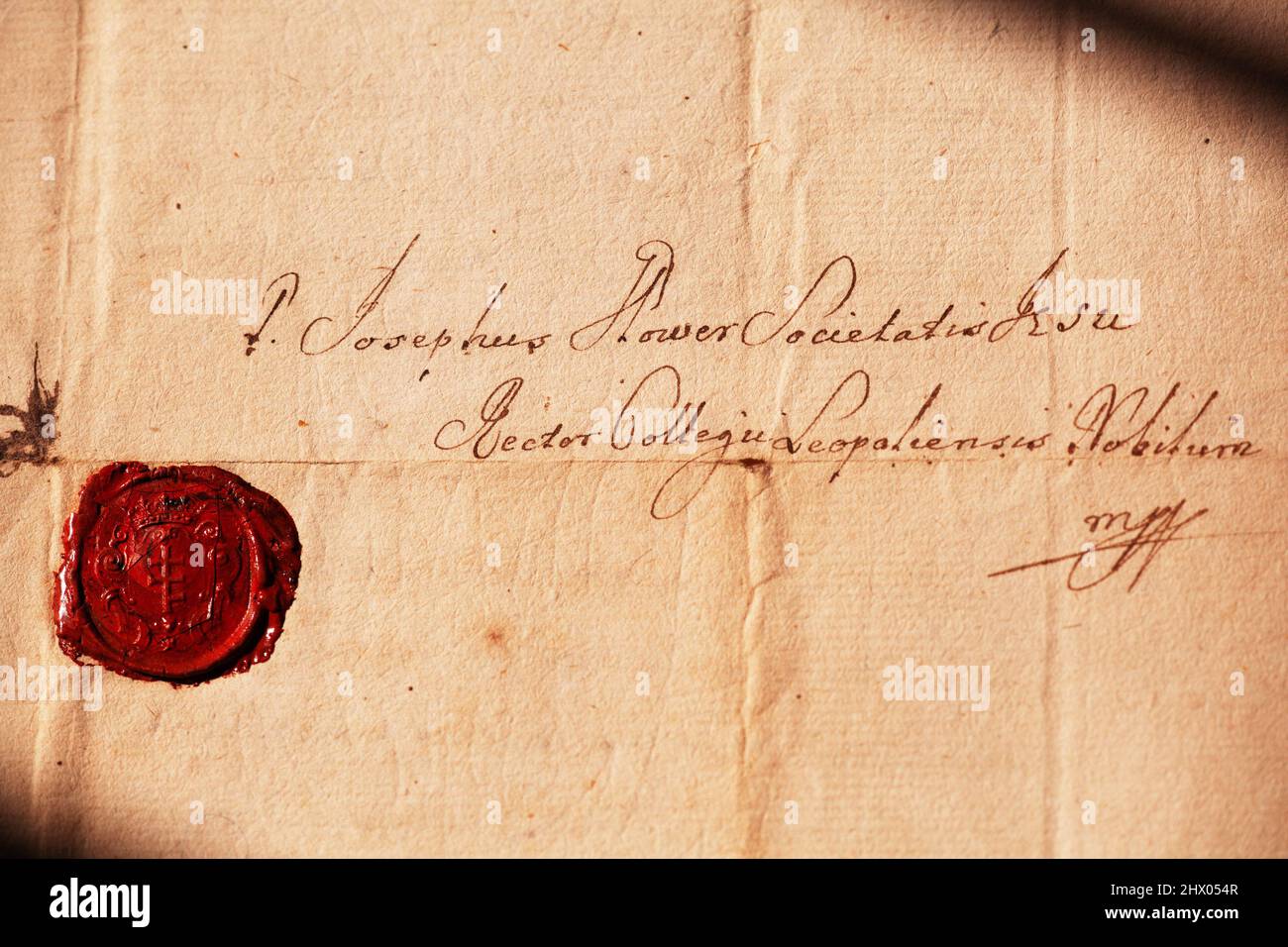 An old letter with a red wax seal. Fragment Of The Real Ancient