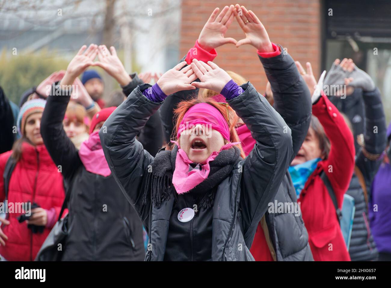 Turin, Italy. 8th Mar, 2022. Activists of the Non Una Di Meno transfeminist movement strike on International Women's Day and demonstrate against sexist violence and the high number of femicides in Italy while making vagina sign. Credit: MLBARIONA/Alamy Live News Stock Photo