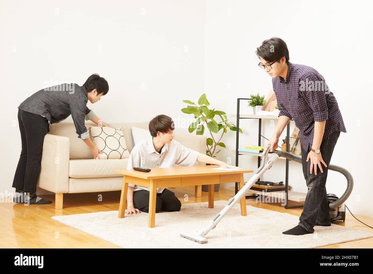 Japanese Men Cleaning The Room Stock Photo Alamy