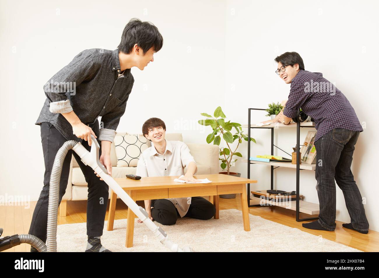 Japanese Men Cleaning The Room Stock Photo Alamy