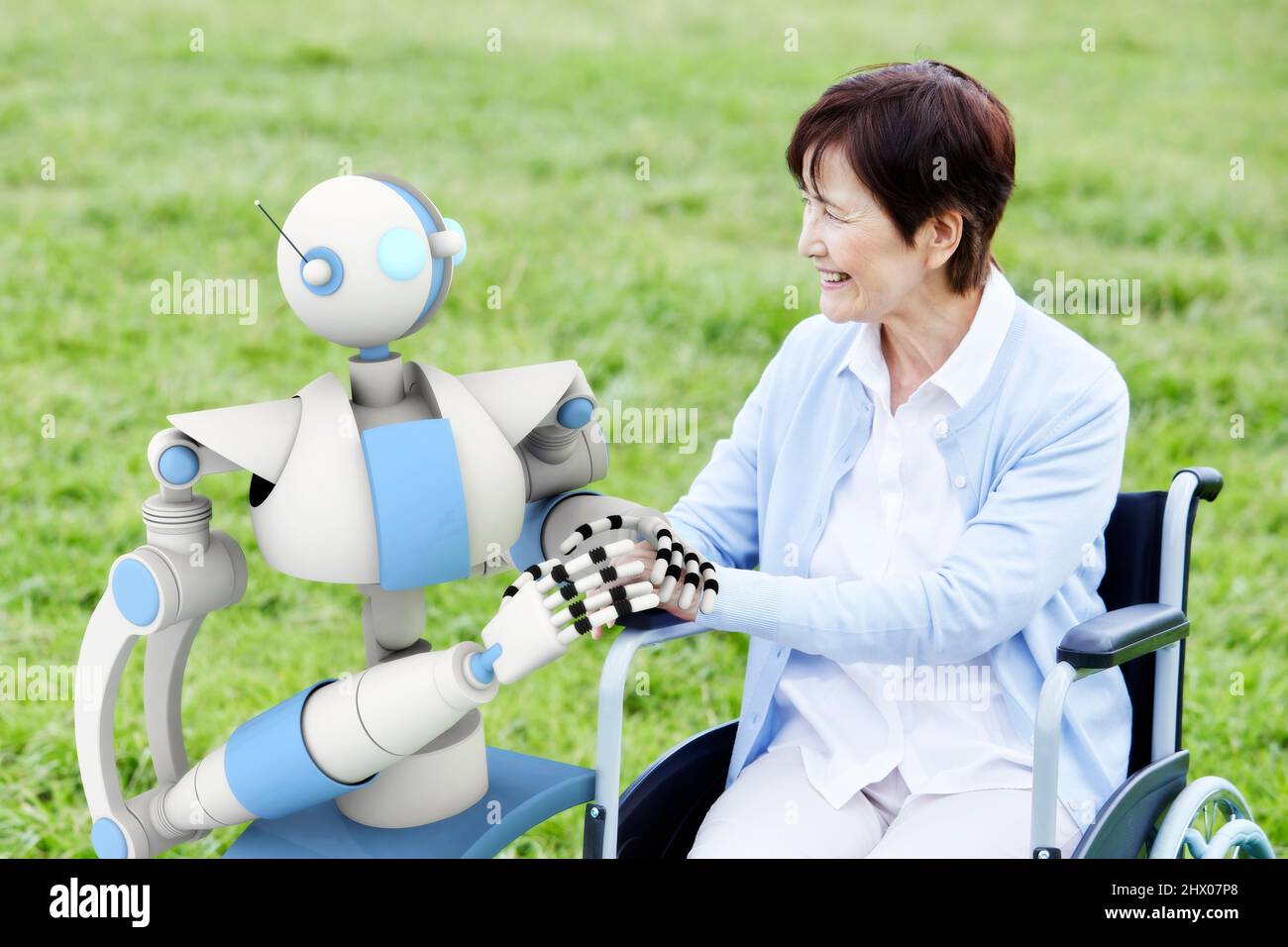 Senior Woman In A Wheelchair And A Care Robot Stock Photo - Alamy