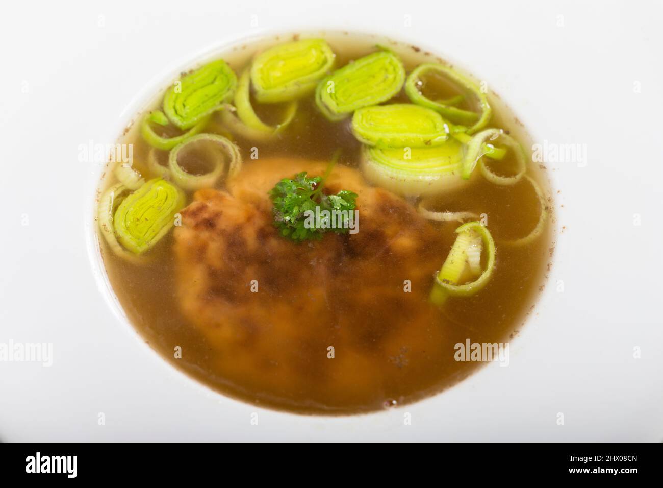 austrian cheese dumpling soup on wood Stock Photo