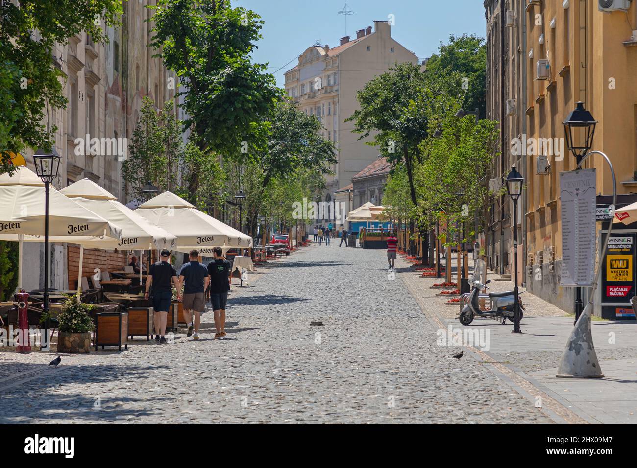 Belgrade, Serbia - July 08, 2021: Empty Skadarlija Cobblestones Street at Hot Summer Day. Stock Photo