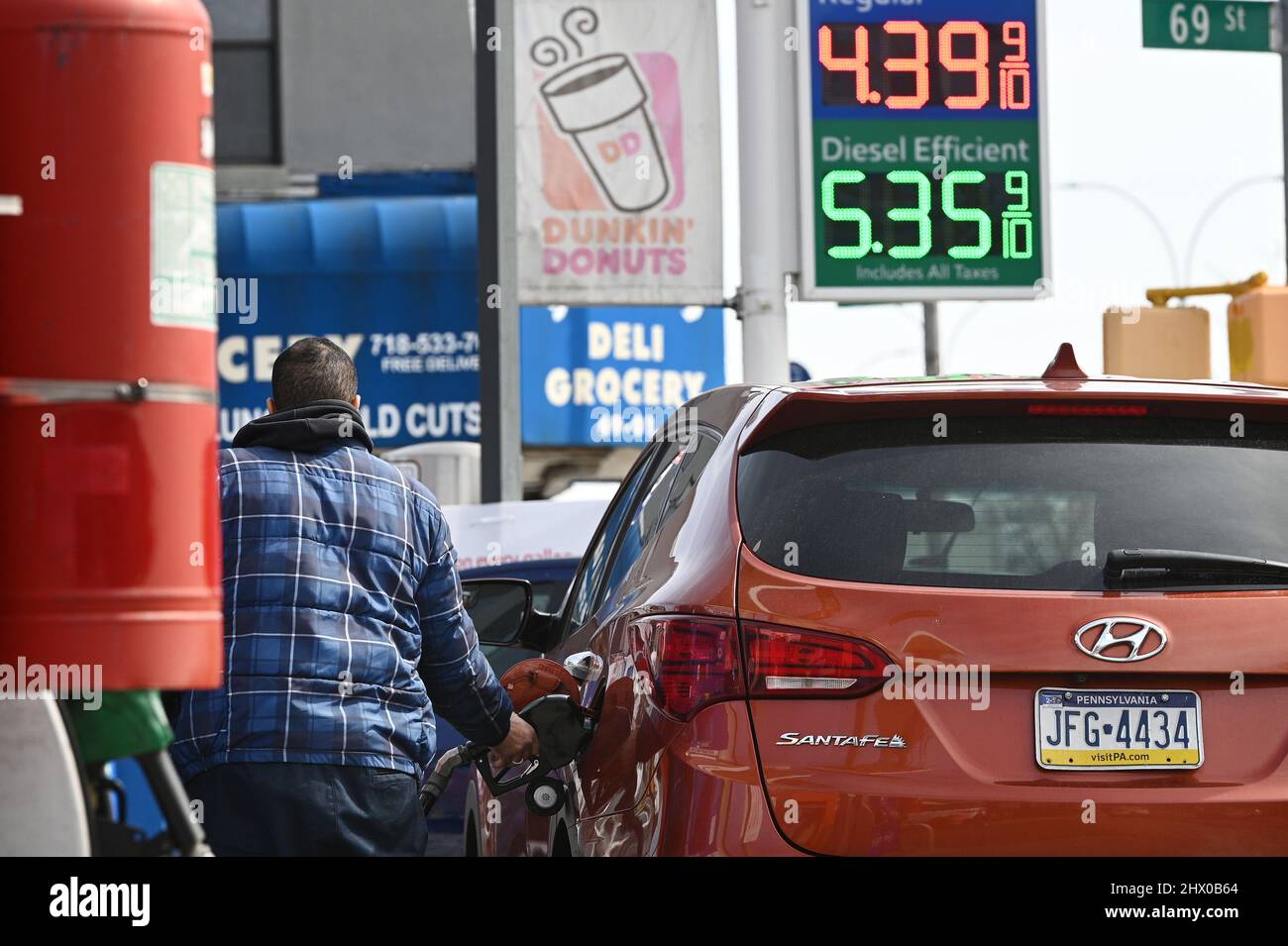 New York, USA. 08th Mar, 2022. A person fuels their car as gas prices