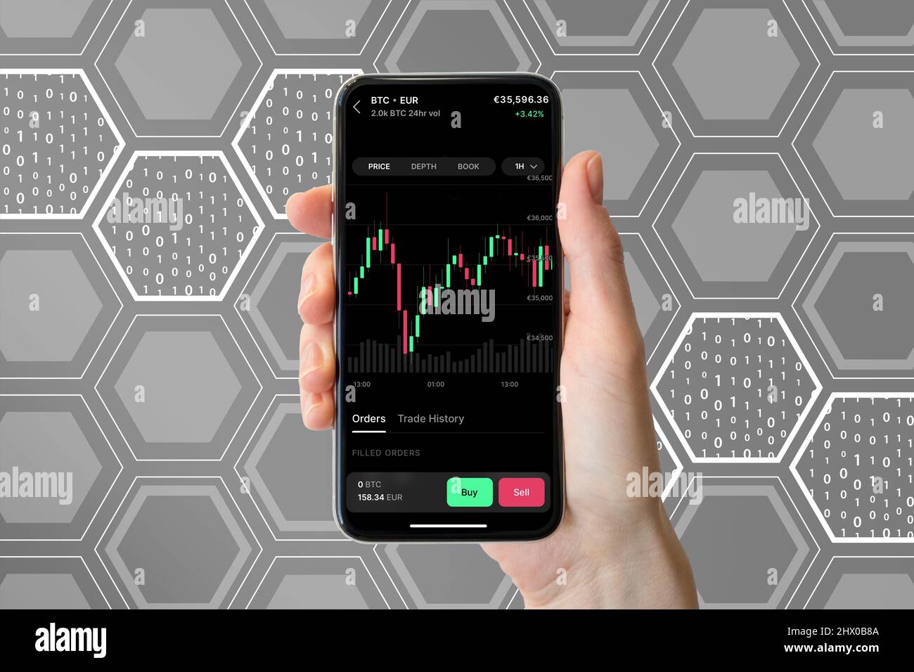 Frankfurt, Germany - 03 01 2022: Coinbase Pro app displayed on modern smart phone. Hand holding smart phone to trade crypto currency bitcoin in EUR. Stock Photo