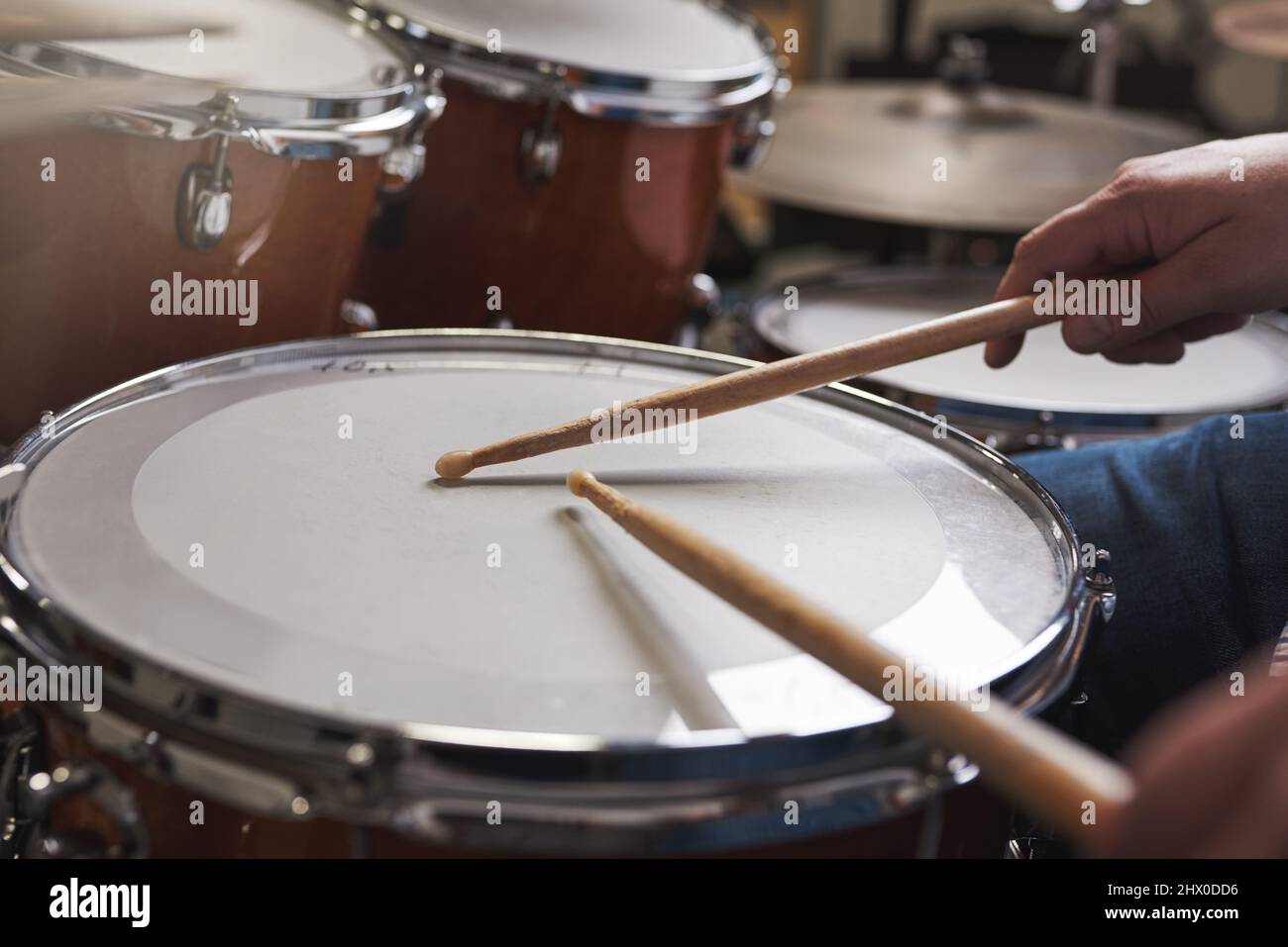 Drumroll, please. Cropped shot of an unrecognizable man playing the