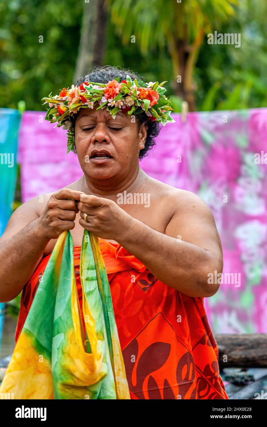 Polynesian woman with flower hair decoration in Bora Bora, French Polynesia. Stock Photo