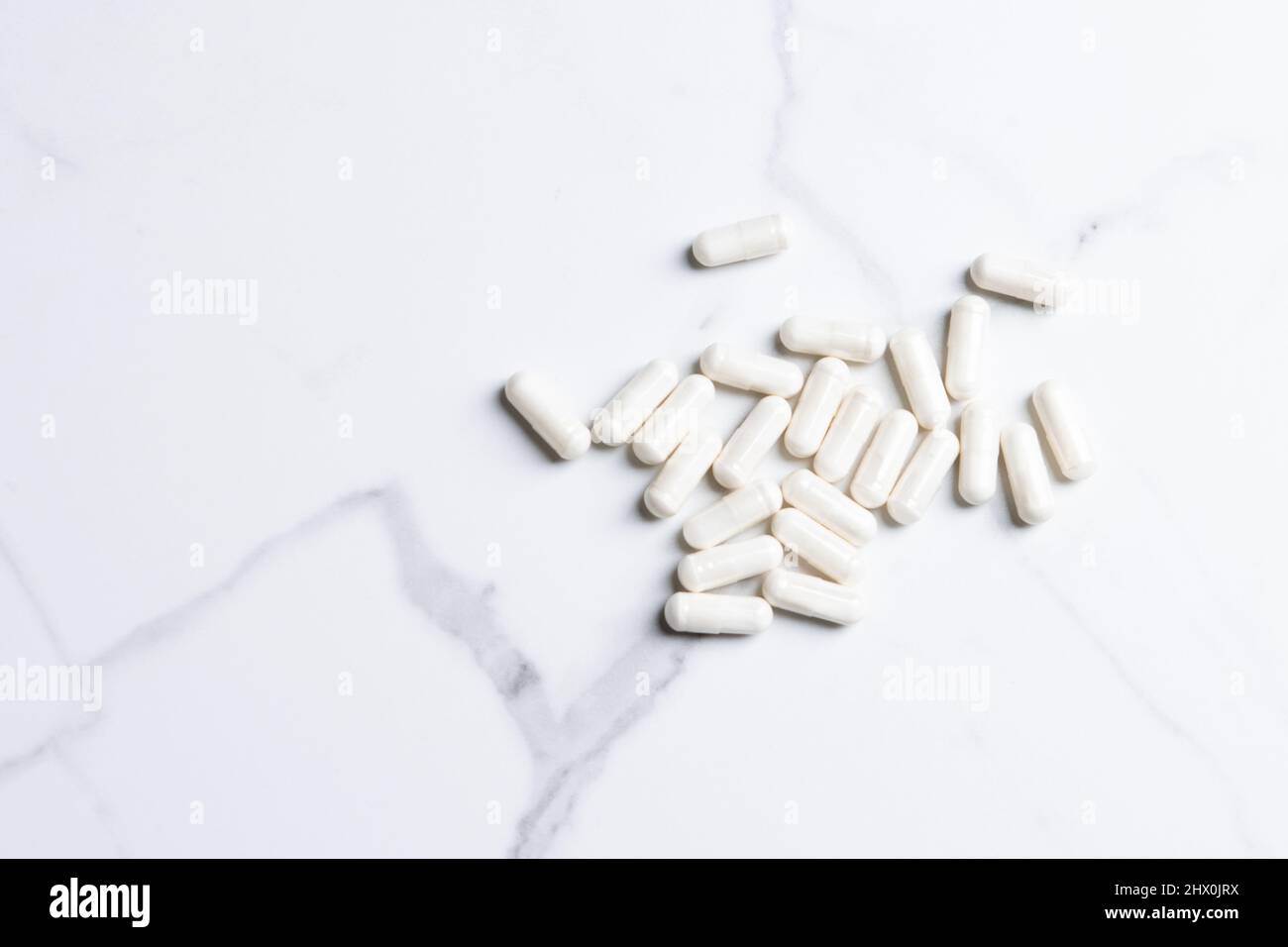 close up of white capsules pills Stock Photo
