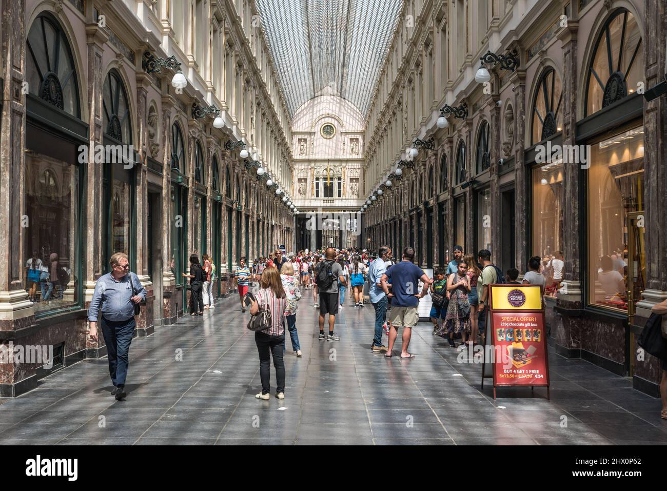 Brussels Old Town Belgium 06 25 2019 People in summer clothes walking through the Saint