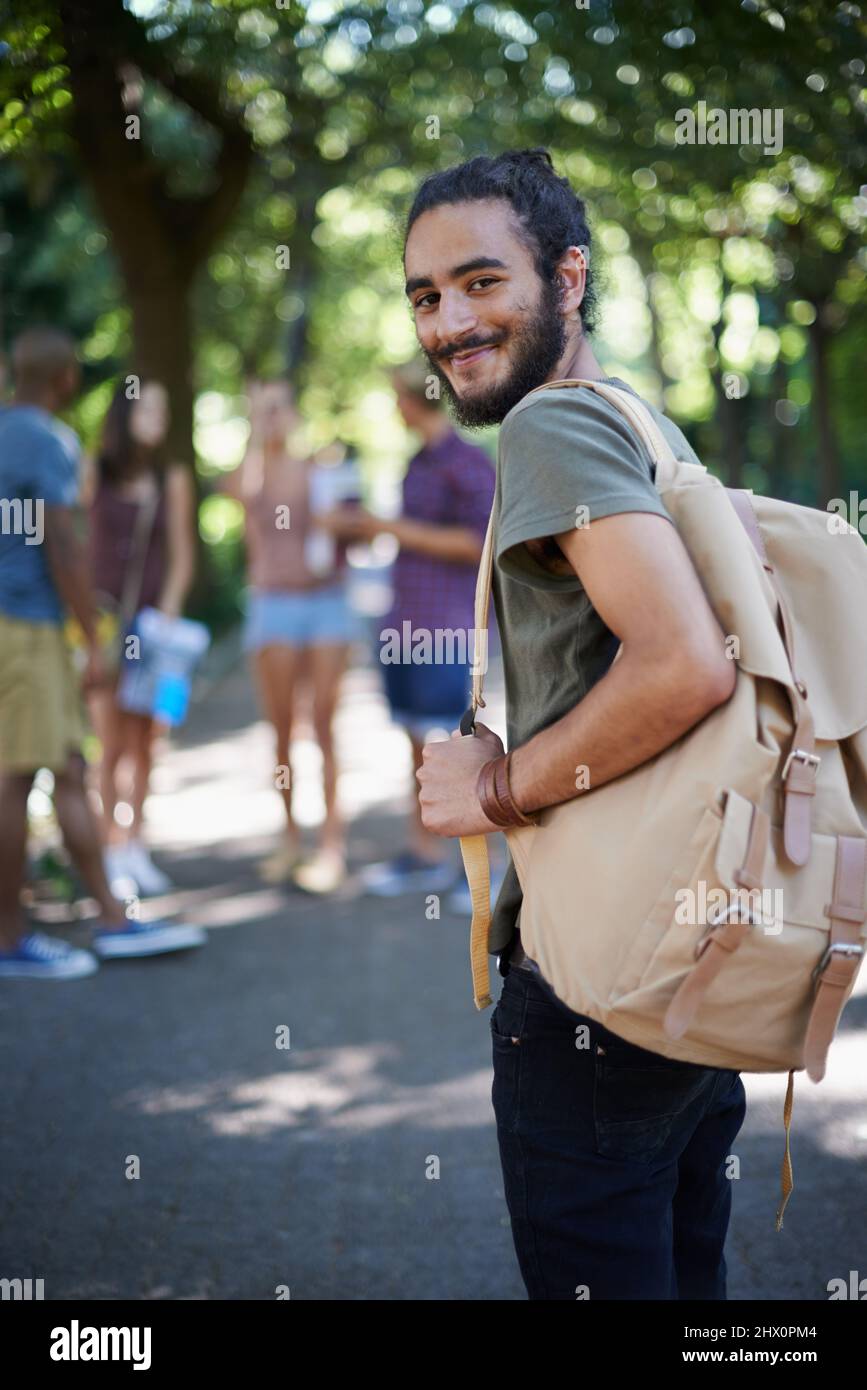 Its the student life for me. Portrait of a handsome young man on campus. Stock Photo