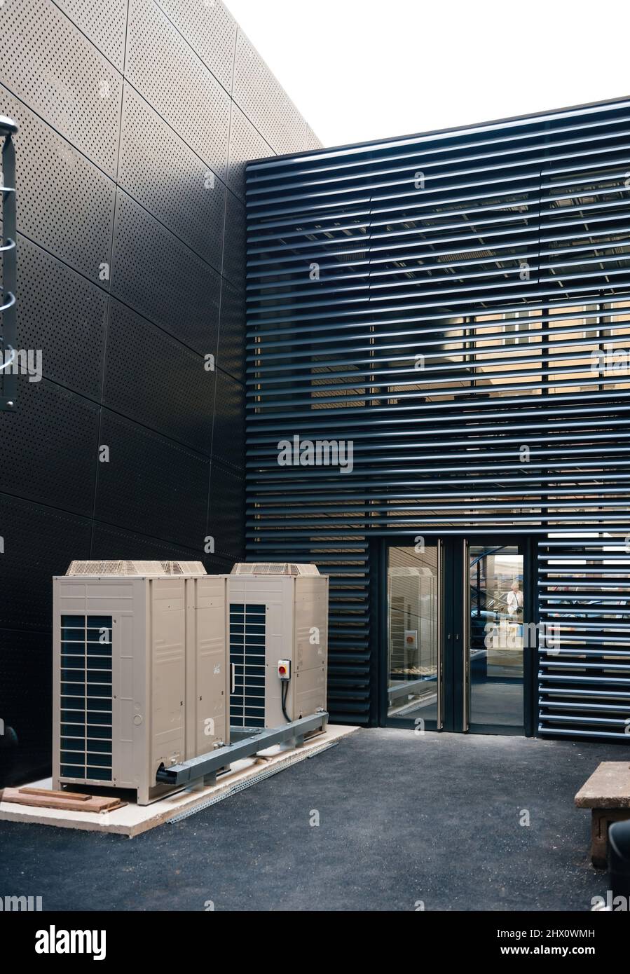 Two large HVAC Heating, ventilation, and air conditioning unit outside