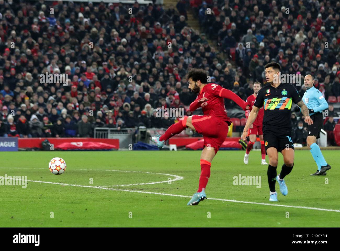 8th March 2022 ; Anfield, Liverpool, England; Champions League football, Liverpool versus Inter Milan : Mohammed Salah of Liverpool  volleys a shot at goal Stock Photo