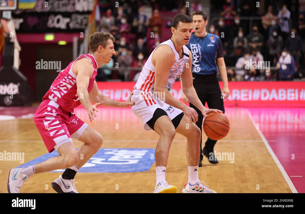 Bonn, Germany. 08th Mar, 2022. Telekom Dome, Basketball Bundesliga,  Matchday 24, BBL, Telekom Baskets Bonn vs FC Bayern Munich, Skyler Bowlin ( Bonn), Zan Mark Sisko (Bayern) battle for the ball. Credit: Juergen