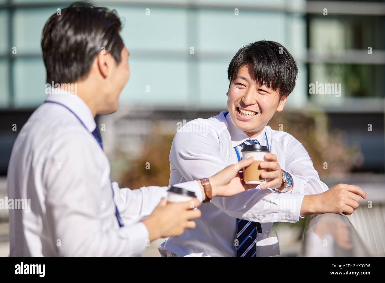 Japanese Businessmen Chatting Stock Photo
