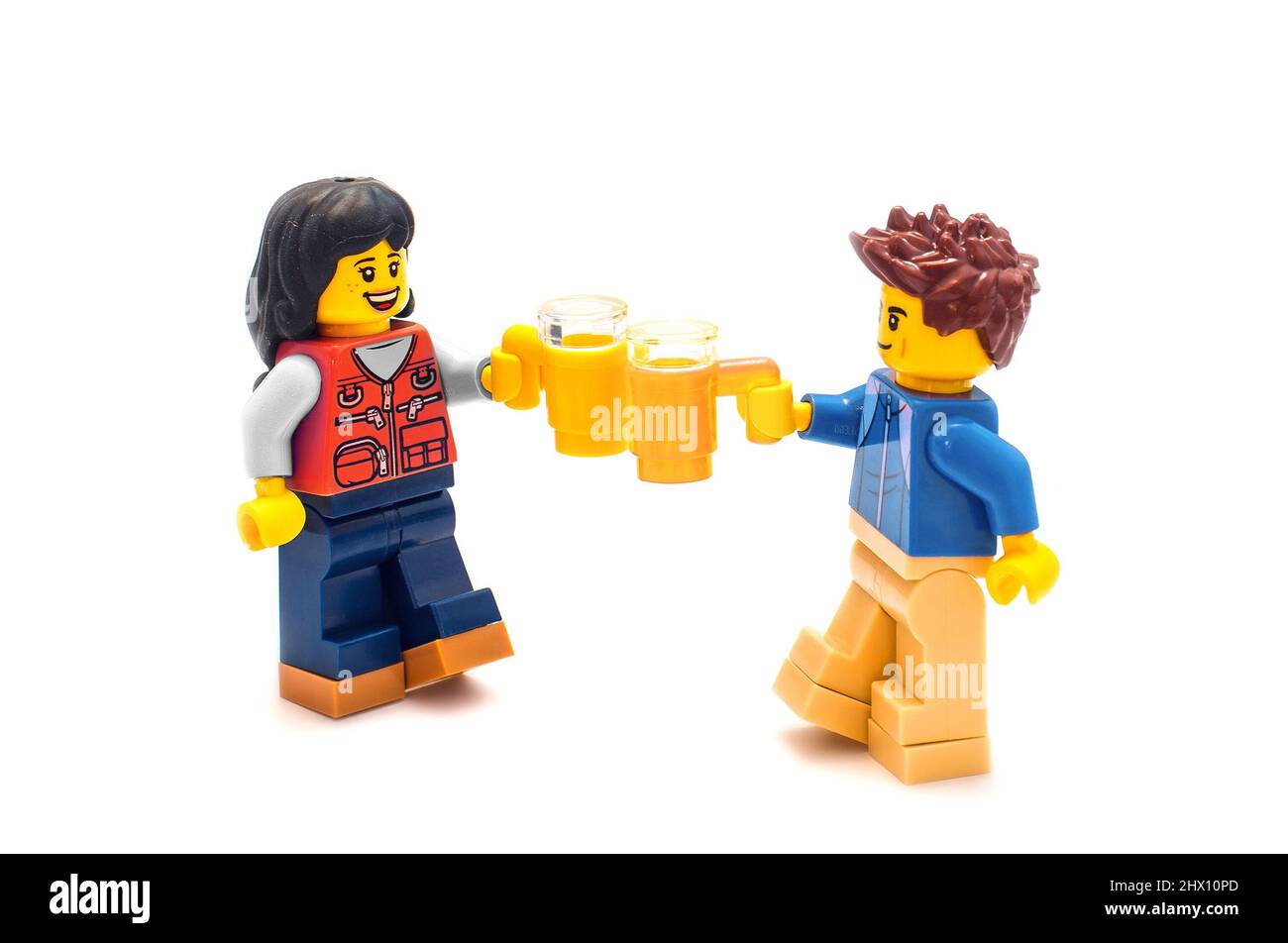 2022: Lego toy personages on white, couple with beer mugs.  russian-ukrainians people concept Stock Photo - Alamy