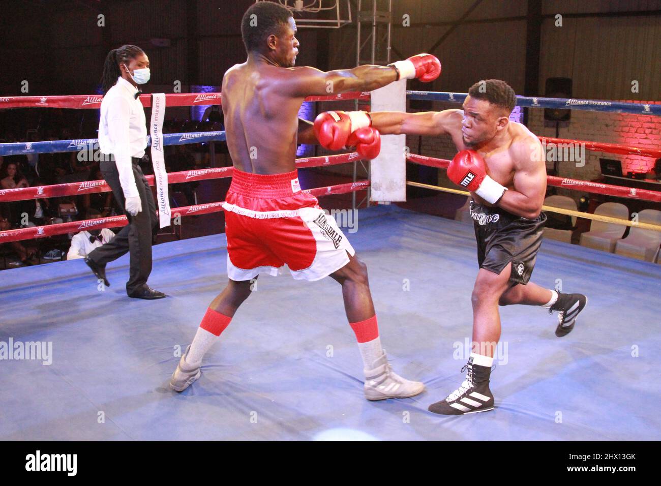 Harare, Zimbabwe. 4th Mar, 2022. Diana Makumbe (L) referees a boxing
