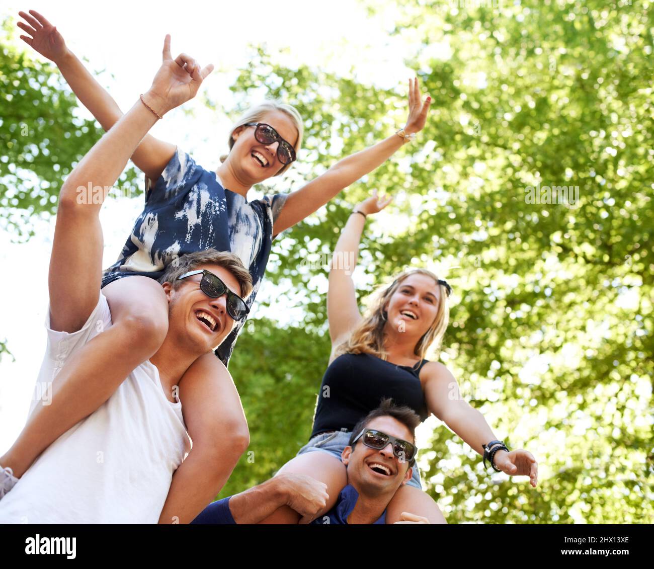 Carrying a friend on shoulders hi-res stock photography and images - Alamy