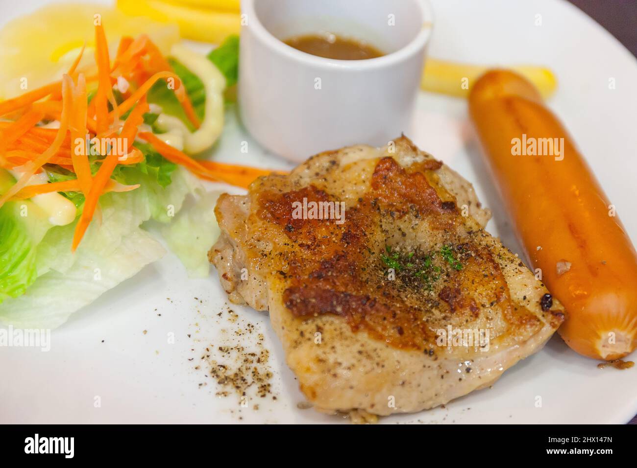 Chicken Steak with Black Pepper and Sausage Stock Photo Alamy