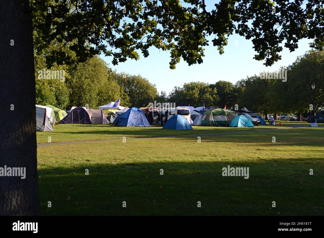 Christchurch, New Zealand, February 22, 2021: Tents at the Cranmer Square mandate protest in Christchurch. Activists pitched tents and occupied the square peacefully for several weeks. Stock Photo